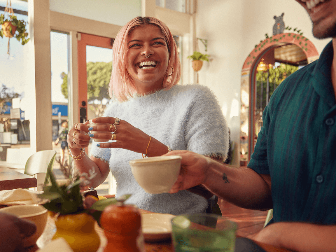 People chatting over coffee and having a good time