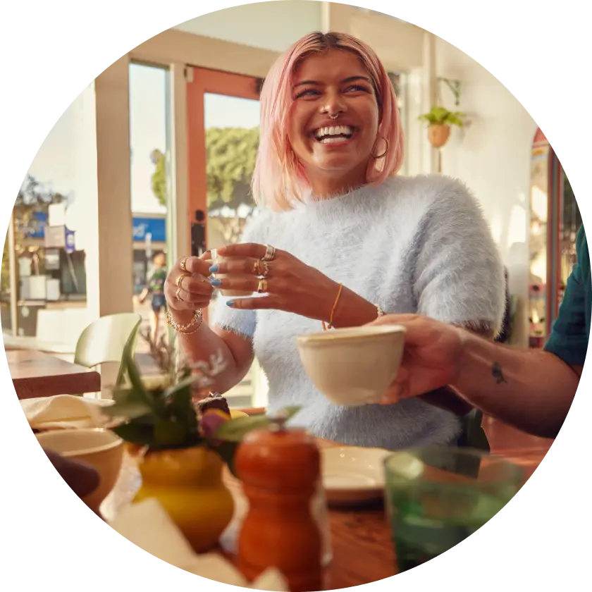 image of a person smiling to another person